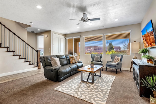 3800 Paradise Village Dr Unit 84, Santa Clara, UT 84765 - living area featuring ceiling fan, a textured ceiling, stairway, carpet, and baseboards