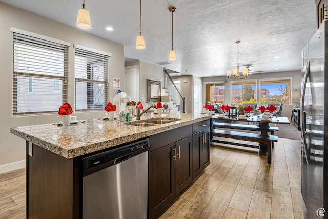 3800 Paradise Village Dr Unit 84, Santa Clara, UT 84765 - kitchen featuring stainless steel appliances, light wood-style floors, a chandelier, a sink, and recessed lighting