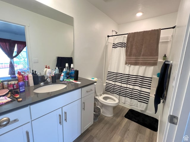 612 N Canvasback Dr, Lehi, UT 84043 - full bathroom with wood finished floors, vanity, toilet, and shower / bath combination with curtain