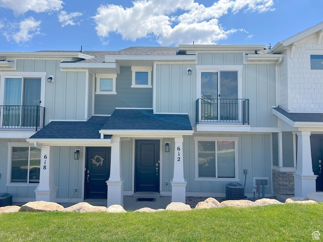 612 N Canvasback Dr, Lehi, UT 84043 - multi unit property featuring board and batten siding, a balcony, central AC, and a shingled roof