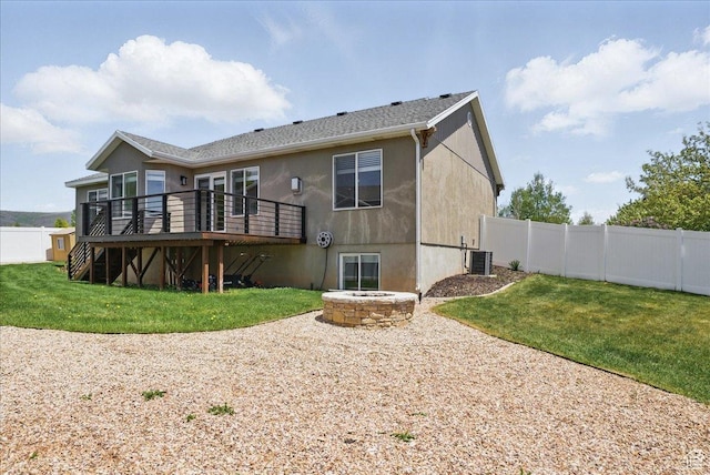 5167 N Rodeo Cir Unit 6, Oakley, UT 84055 - back of property with cooling unit, a wooden deck, stucco siding, and a fire pit
