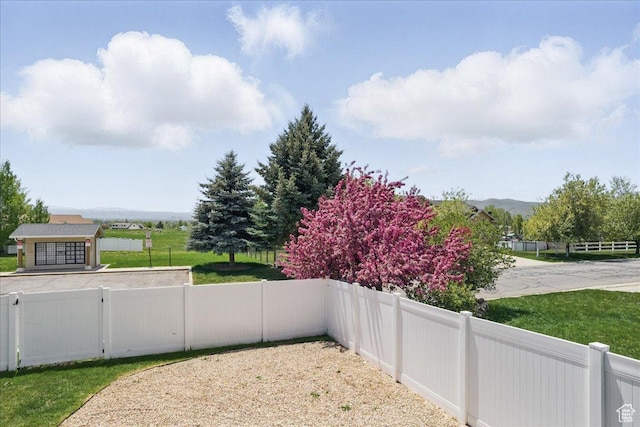 5167 N Rodeo Cir Unit 6, Oakley, UT 84055 - fenced yard with a mountain view