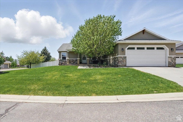 5167 N Rodeo Cir Unit 6, Oakley, UT 84055 - view of front facade featuring stone siding, a front lawn, and stucco siding