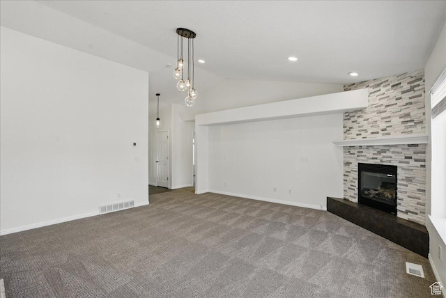 5167 N Rodeo Cir Unit 6, Oakley, UT 84055 - unfurnished living room featuring lofted ceiling, carpet flooring, a tiled fireplace, baseboards, and recessed lighting
