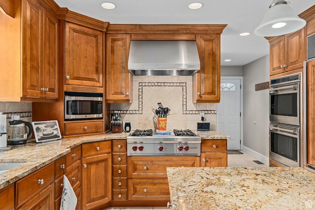 10927 S Lostwood Dr, Sandy, UT 84092 - kitchen featuring wall chimney exhaust hood, stainless steel appliances, decorative backsplash, light tile patterned floors, and recessed lighting