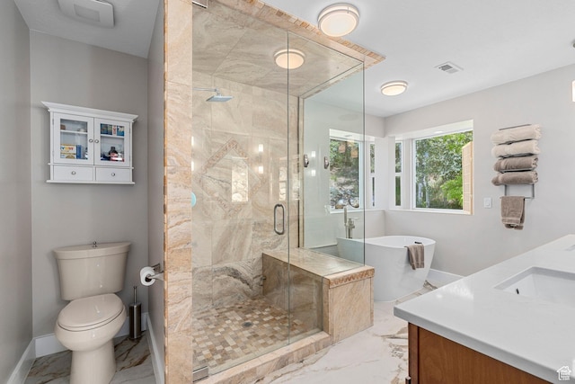 10927 S Lostwood Dr, Sandy, UT 84092 - full bathroom featuring vanity, marble finish flooring, a soaking tub, a stall shower, and baseboards