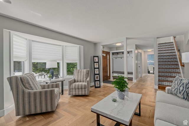 10927 S Lostwood Dr, Sandy, UT 84092 - living area featuring baseboards and stairs