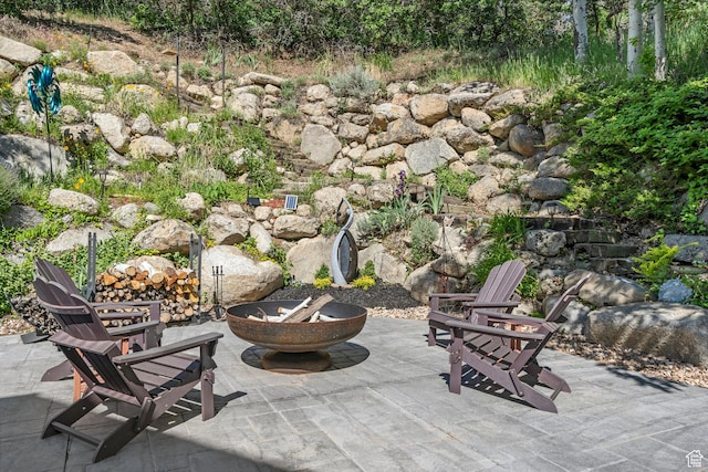 10927 S Lostwood Dr, Sandy, UT 84092 - view of patio with an outdoor fire pit
