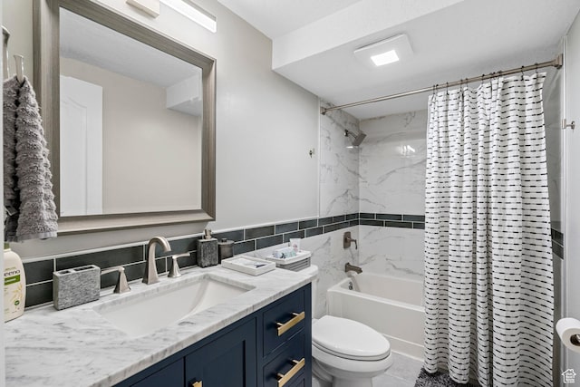 10927 S Lostwood Dr, Sandy, UT 84092 - full bathroom with toilet, vanity, shower / tub combo, and tile walls