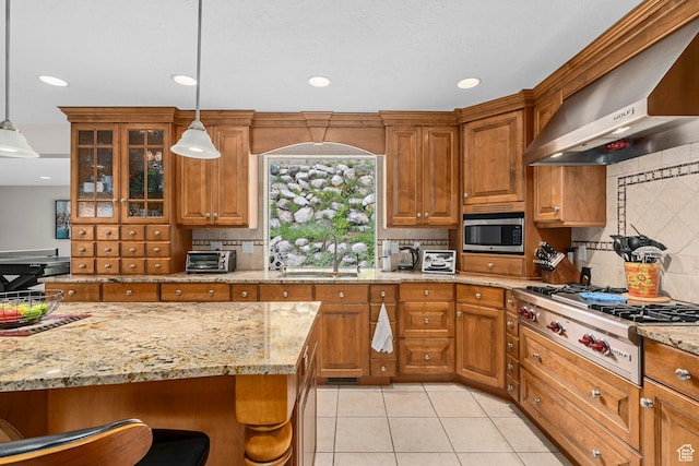 10927 S Lostwood Dr, Sandy, UT 84092 - kitchen featuring wall chimney exhaust hood, a sink, appliances with stainless steel finishes, backsplash, and brown cabinets
