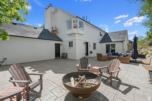 10927 S Lostwood Dr, Sandy, UT 84092 - view of patio / terrace featuring an outdoor living space with a fire pit