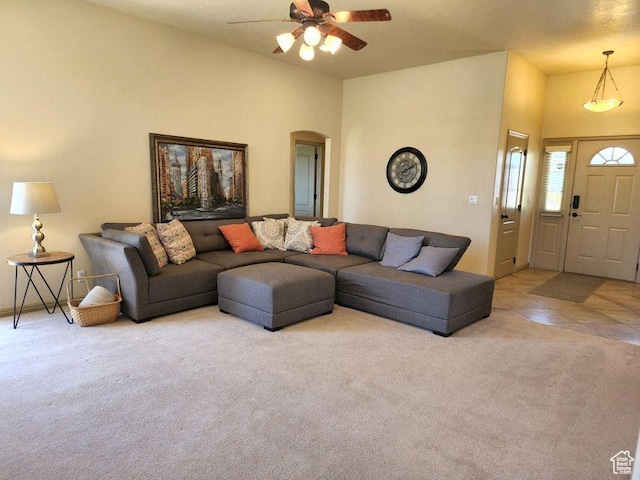 779 S 1850 W, Cedar City, UT 84720 - carpeted living area featuring arched walkways, a ceiling fan, and tile patterned floors