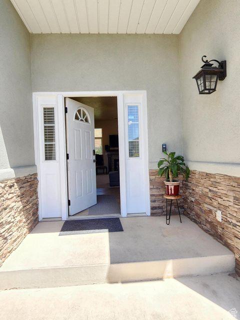 779 S 1850 W, Cedar City, UT 84720 - property entrance featuring stucco siding