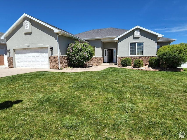 779 S 1850 W, Cedar City, UT 84720 - ranch-style home with stucco siding, stone siding, a front lawn, and a garage