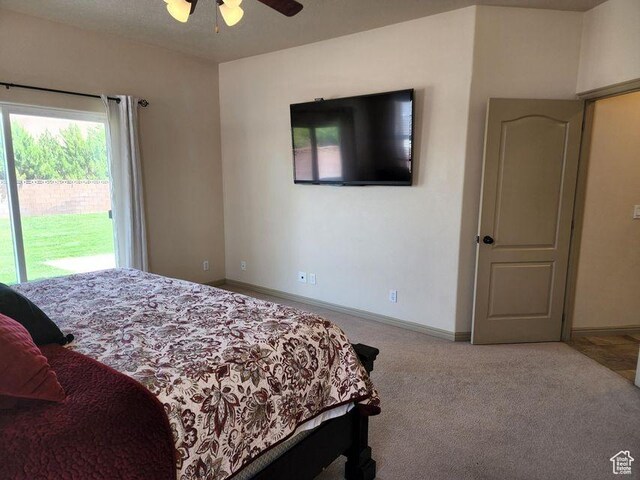779 S 1850 W, Cedar City, UT 84720 - carpeted bedroom featuring access to outside, baseboards, and a ceiling fan
