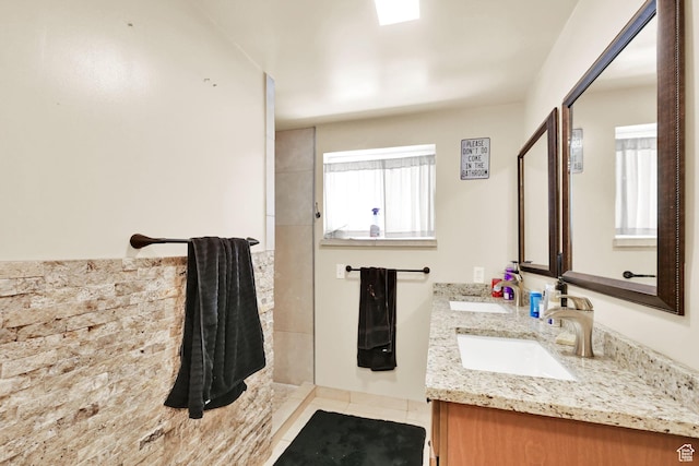 4825 S Burch Creek Dr E, South Ogden, UT 84403 - bathroom with double vanity, tile patterned floors, and a tile shower