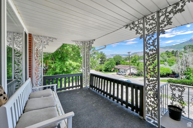 4825 S Burch Creek Dr E, South Ogden, UT 84403 - covered porch featuring a mountain view