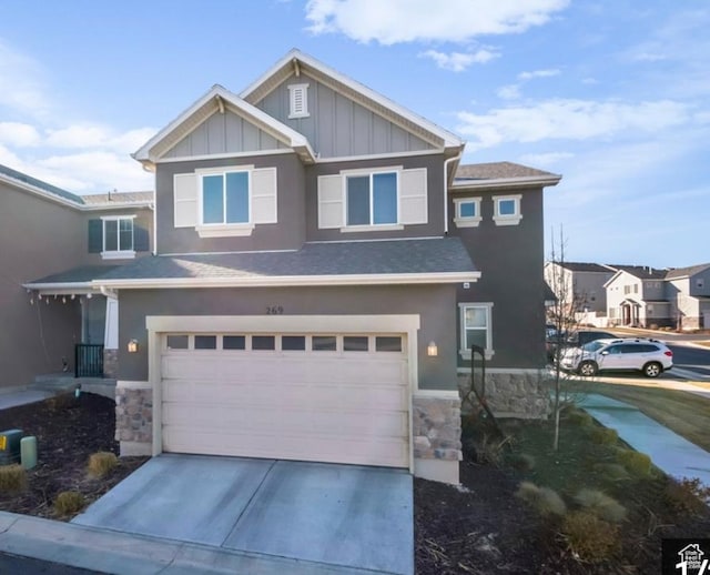 269 W Willow Dr, Saratoga Springs, UT 84045 - craftsman inspired home featuring stone siding, a garage, and concrete driveway