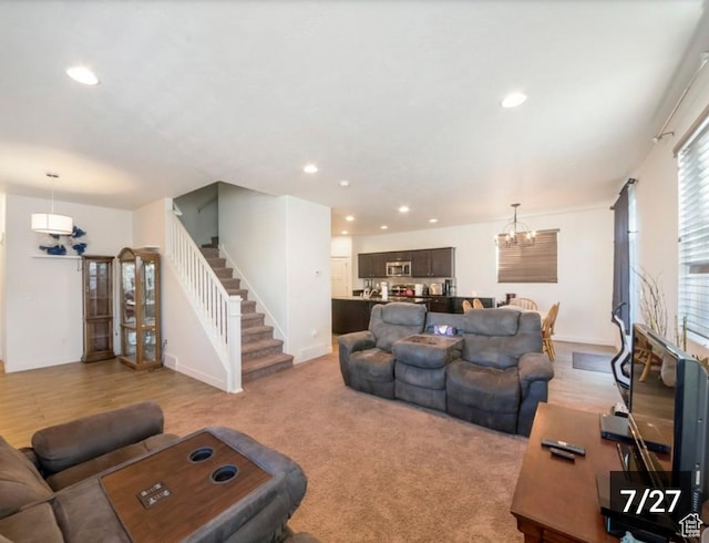 269 W Willow Dr, Saratoga Springs, UT 84045 - living room with stairs, a chandelier, recessed lighting, and baseboards