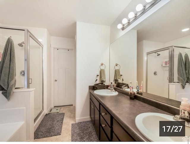269 W Willow Dr, Saratoga Springs, UT 84045 - bathroom featuring a shower stall, double vanity, a bath, and tile patterned flooring