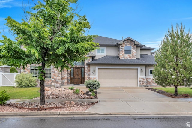 758 W 375 N, Springville, UT 84663 - view of front of home featuring stone siding, stucco siding, driveway, and a garage