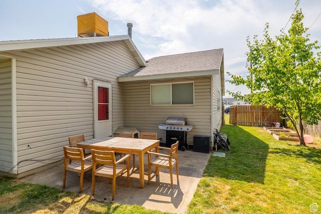 429 S Storrs Ave, American Fork, UT 84003 - rear view of house featuring a patio, outdoor dining area, a shingled roof, and a chimney