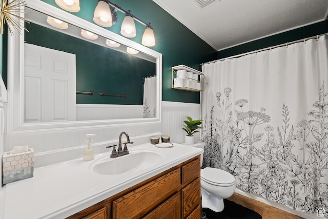429 S Storrs Ave, American Fork, UT 84003 - full bathroom with vanity, a wainscoted wall, toilet, and curtained shower
