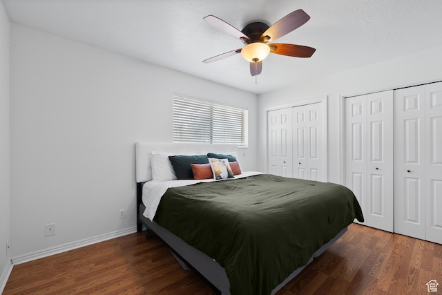 429 S Storrs Ave, American Fork, UT 84003 - bedroom featuring two closets, wood finished floors, baseboards, and ceiling fan