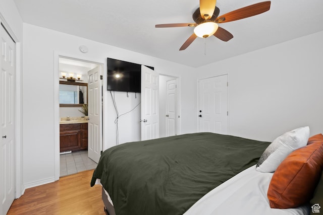 429 S Storrs Ave, American Fork, UT 84003 - bedroom featuring light wood finished floors, ensuite bath, and ceiling fan