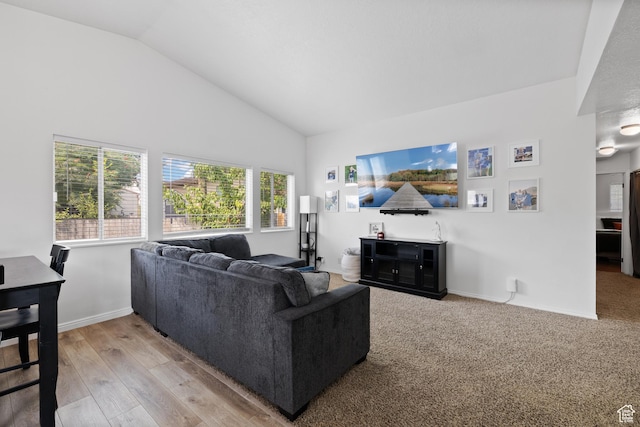 429 S Storrs Ave, American Fork, UT 84003 - living room with baseboards, high vaulted ceiling, and light wood finished floors