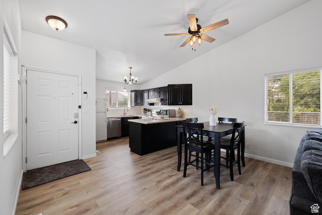 429 S Storrs Ave, American Fork, UT 84003 - dining space featuring a chandelier, light wood-type flooring, ceiling fan, baseboards, and high vaulted ceiling