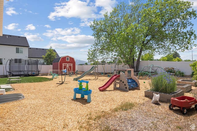 1047 N 700 W, Mapleton, UT 84664 - view of jungle gym with a trampoline, a fenced backyard, and a vegetable garden