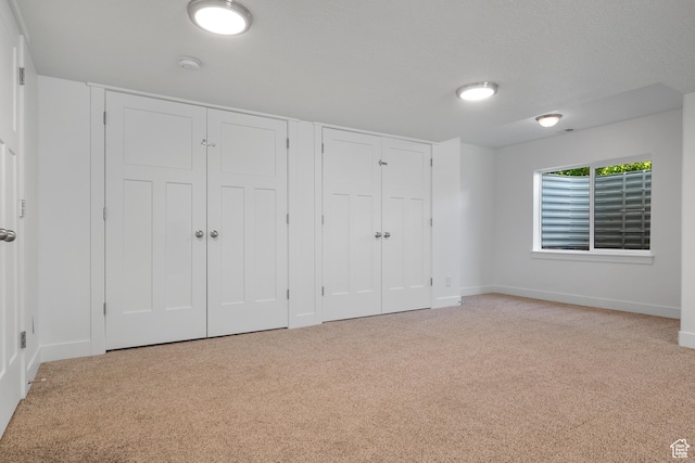 1047 N 700 W, Mapleton, UT 84664 - unfurnished bedroom featuring multiple closets, carpet flooring, and baseboards