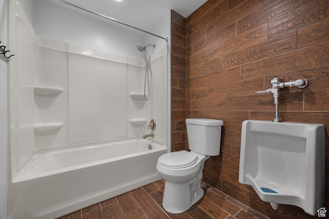1047 N 700 W, Mapleton, UT 84664 - full bathroom featuring toilet,  shower combination, wood finish floors, and wooden walls