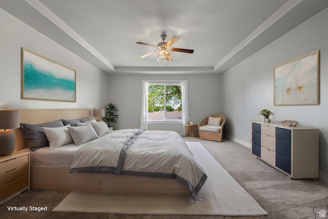 1047 N 700 W, Mapleton, UT 84664 - bedroom featuring light colored carpet, a tray ceiling, baseboards, and a ceiling fan