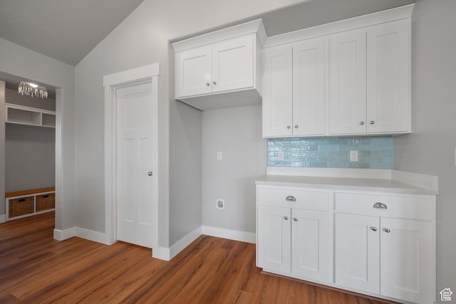 1047 N 700 W, Mapleton, UT 84664 - kitchen featuring light countertops, baseboards, wood finished floors, backsplash, and lofted ceiling