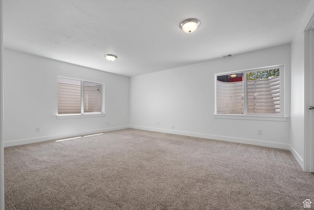 1047 N 700 W, Mapleton, UT 84664 - carpeted spare room with baseboards and a textured ceiling
