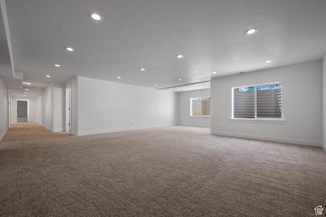 1047 N 700 W, Mapleton, UT 84664 - empty room featuring light carpet, recessed lighting, baseboards, and a textured ceiling