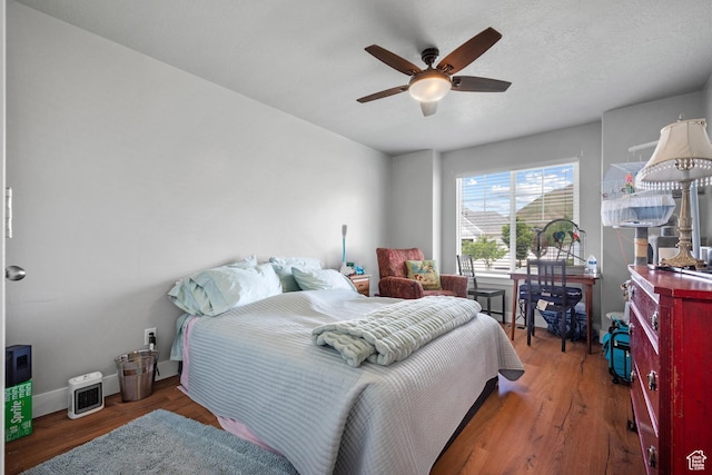 1047 N 700 W, Mapleton, UT 84664 - bedroom featuring wood finished floors, a ceiling fan, and baseboards