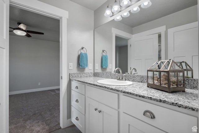 1047 N 700 W, Mapleton, UT 84664 - bathroom with vanity, a ceiling fan, and baseboards