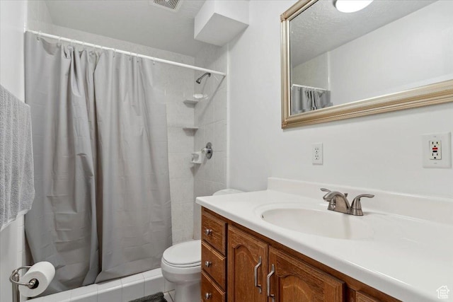 987 N 3150 W, West Point, UT 84015 - bathroom featuring vanity, toilet, and a tile shower