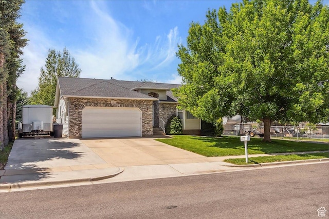 987 N 3150 W, West Point, UT 84015 - view of front facade featuring an attached garage, a front yard, concrete driveway, and a shingled roof