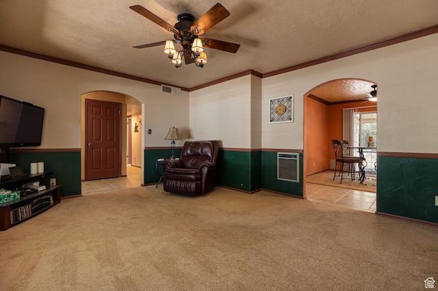 845 S 80 W, Hurricane, UT 84737 - sitting room with arched walkways, ornamental molding, ceiling fan, carpet flooring, and a textured ceiling