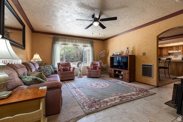 845 S 80 W, Hurricane, UT 84737 - tiled living area featuring ceiling fan, heating unit, a textured ceiling, crown molding, and arched walkways