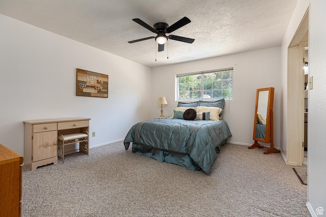 845 S 80 W, Hurricane, UT 84737 - carpeted bedroom with a textured ceiling, baseboards, and a ceiling fan