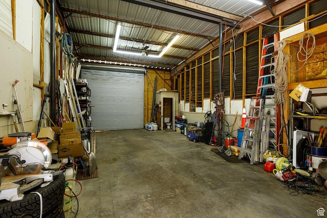 845 S 80 W, Hurricane, UT 84737 - garage with a workshop area and metal wall