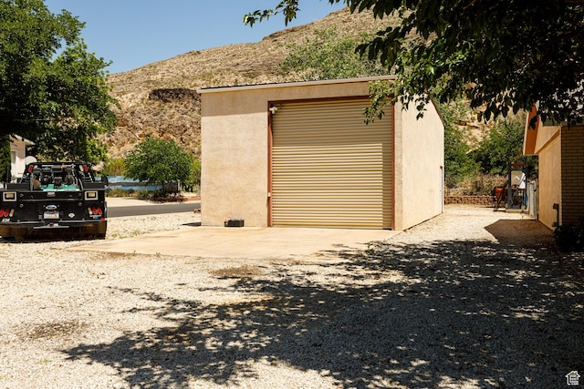 845 S 80 W, Hurricane, UT 84737 - detached garage featuring a mountain view and concrete driveway