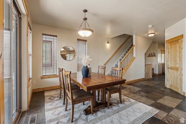 5430 N Cross Country Way, Park City, UT 84098 - dining area with baseboards, stairs, and dark stone finish flooring