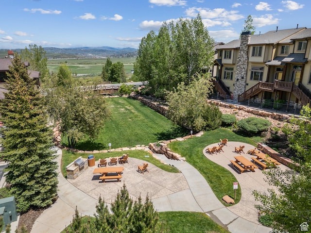 5430 N Cross Country Way, Park City, UT 84098 - surrounding community with stairway, a fire pit, a patio area, and a yard
