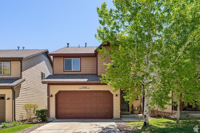 5430 N Cross Country Way, Park City, UT 84098 - view of front of property with an attached garage, concrete driveway, and roof with shingles